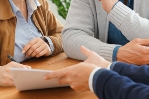 man showing couple application documents