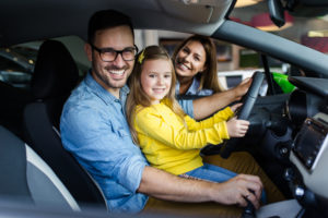 family in new car