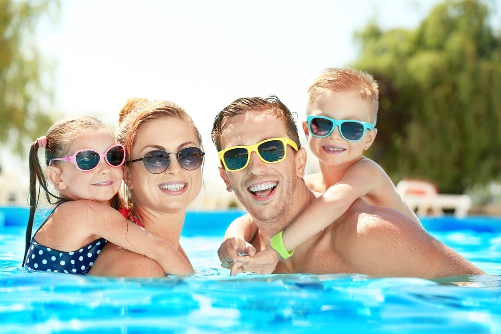 family in pool