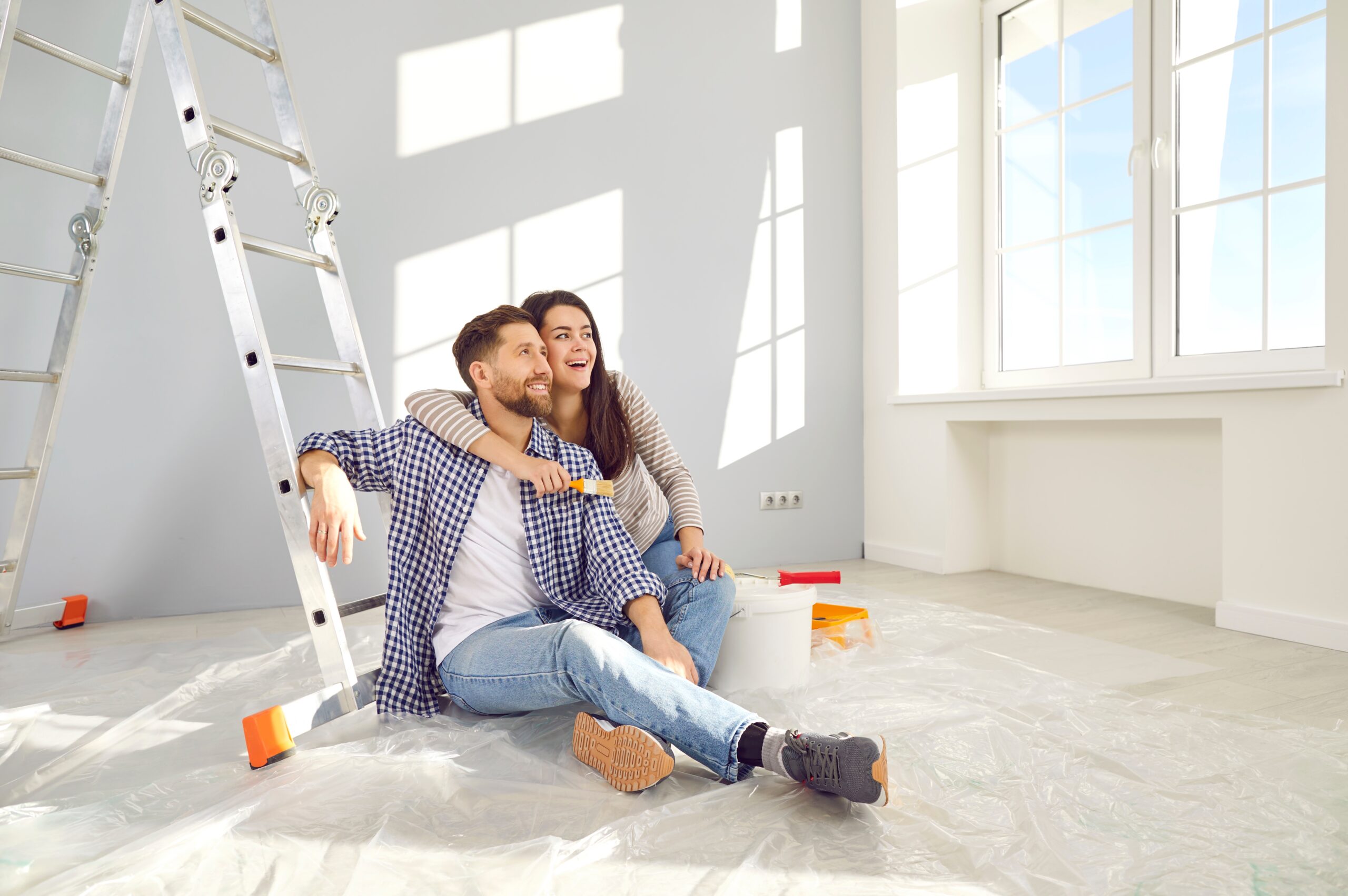 Homeowner budgeting spring home improvement project